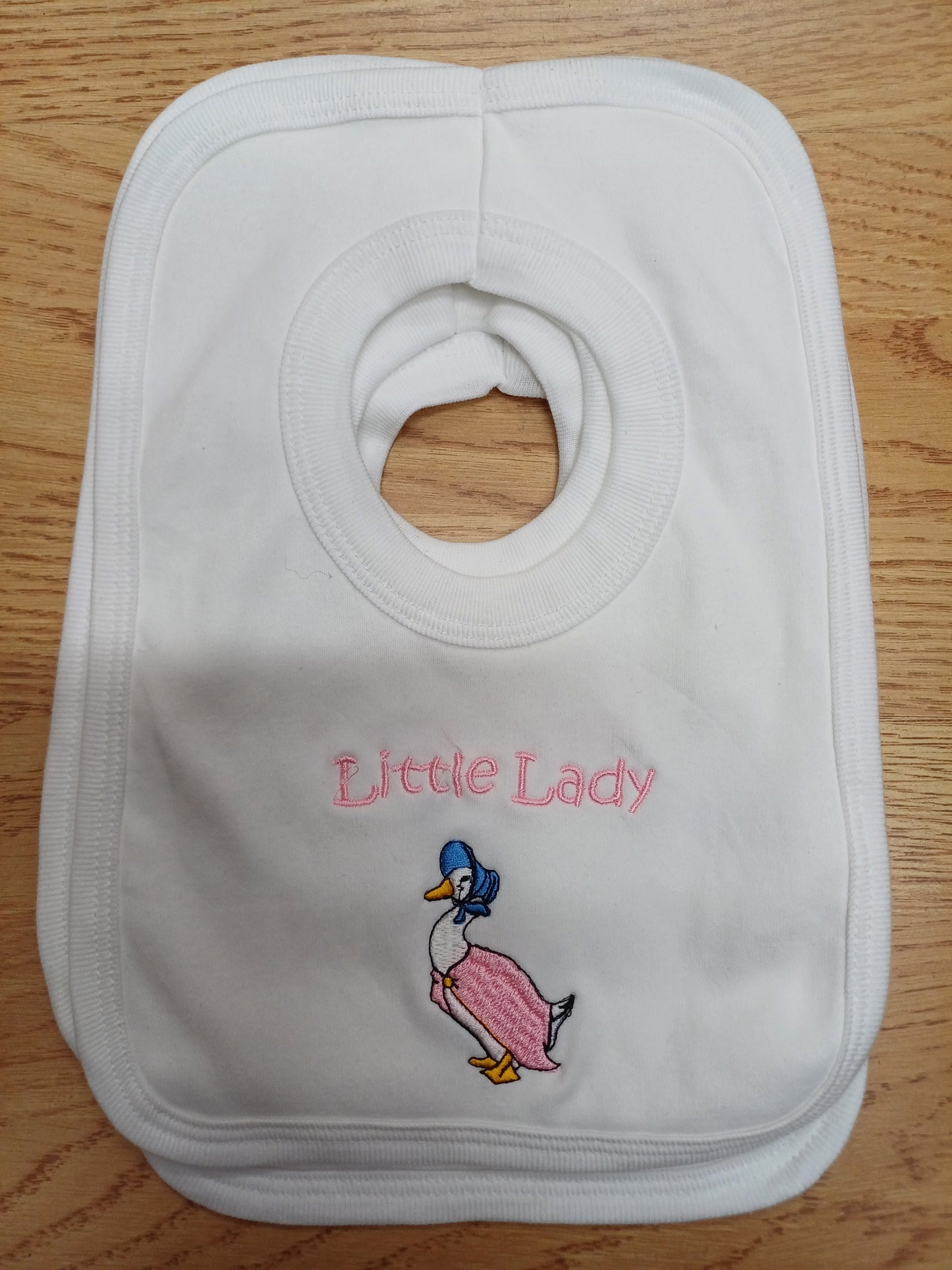 Baby Boys or girls 100% soft cotton bib embroidered with peter rabbit or jemima puddle duck