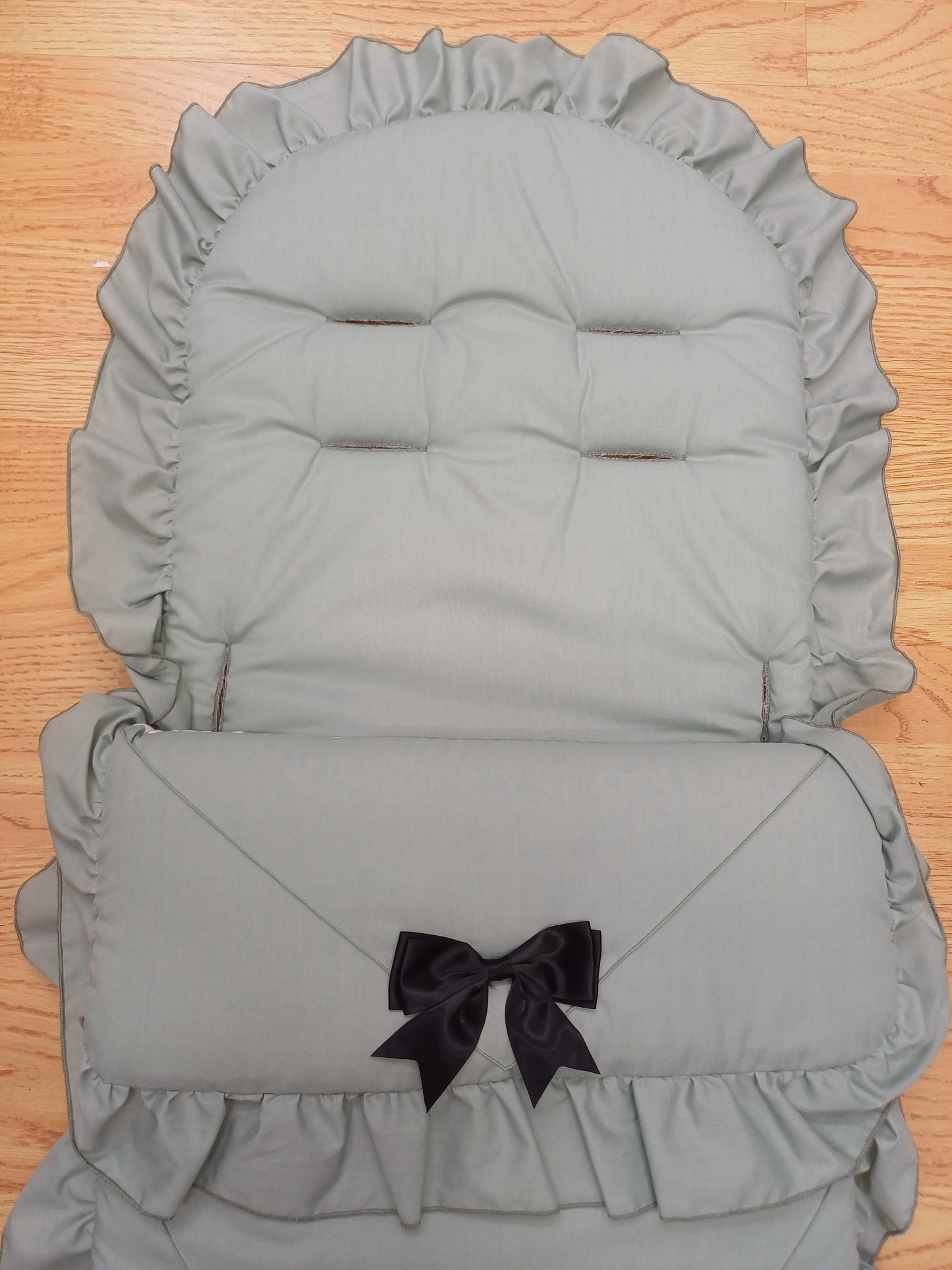 Babys boys or girls universal pram cosytoes footmuff pram set with bows colour sage green / black bows