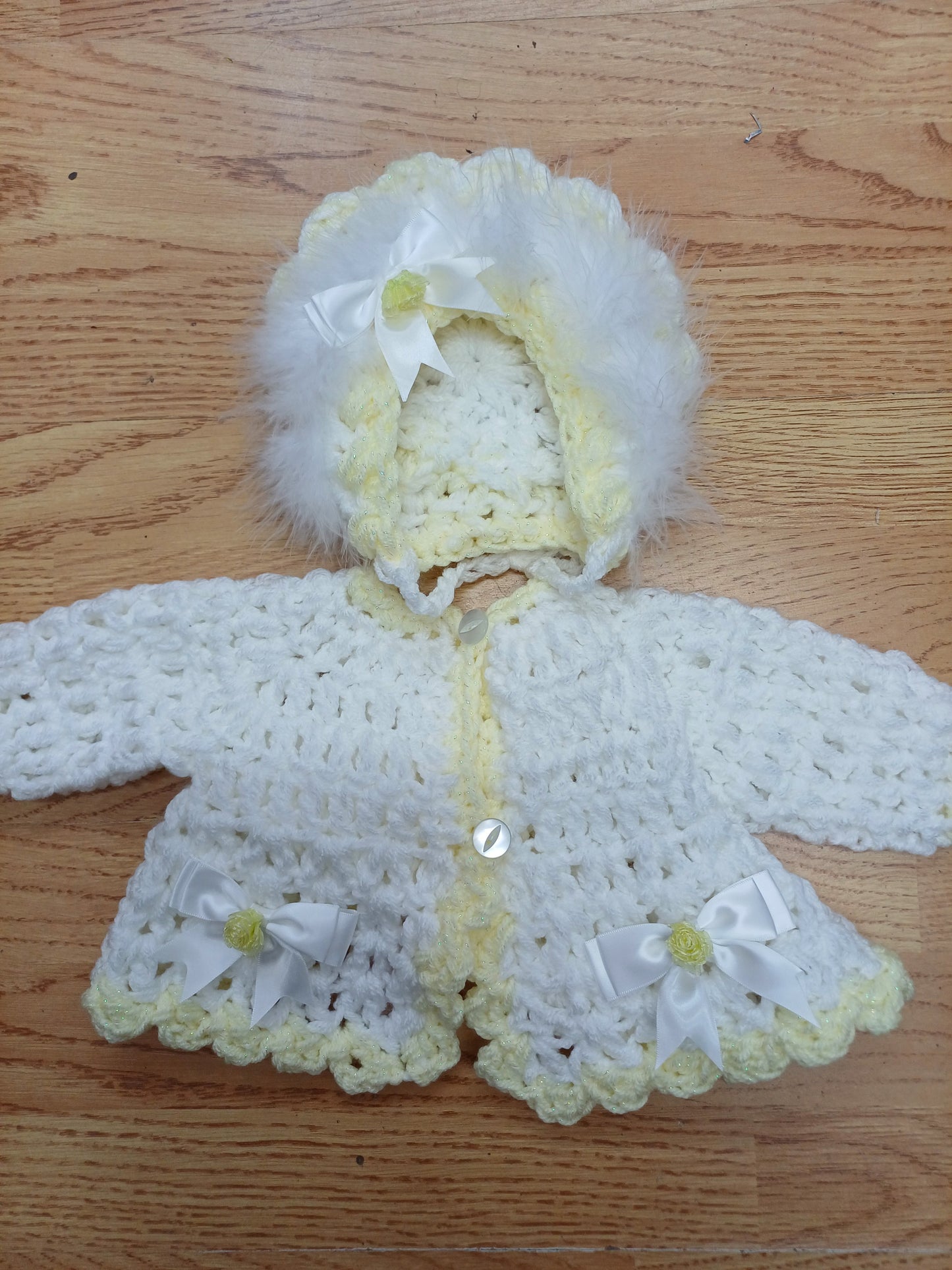Baby girls handmade crocheted pretty cardigan and bonnet set with bows