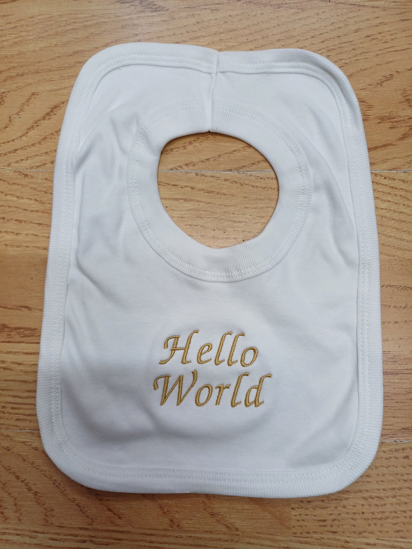 Babys cotton bib embroidered with just arrived or hello world