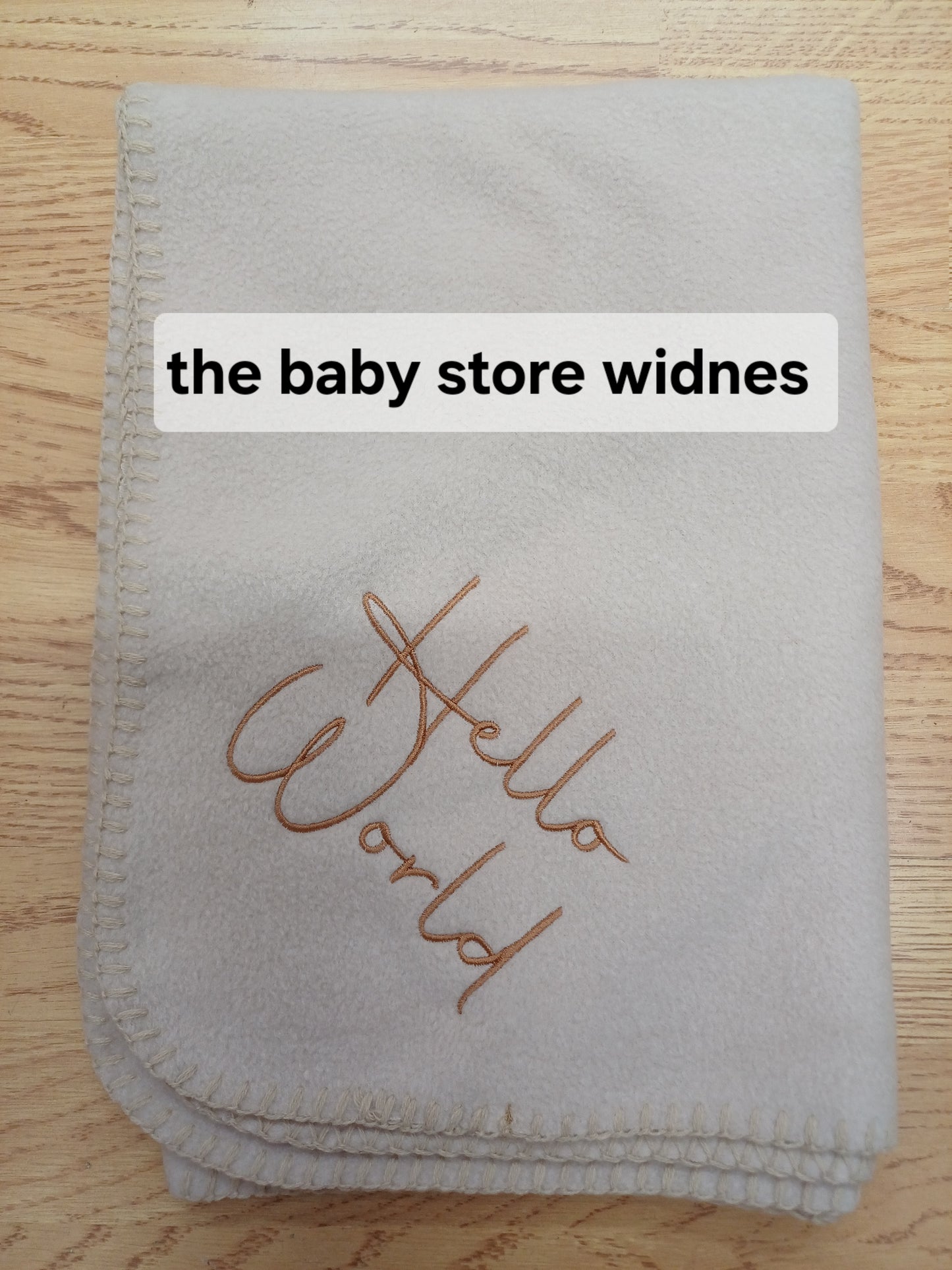 Babys fleece blanket / wrap embroidered with hello world