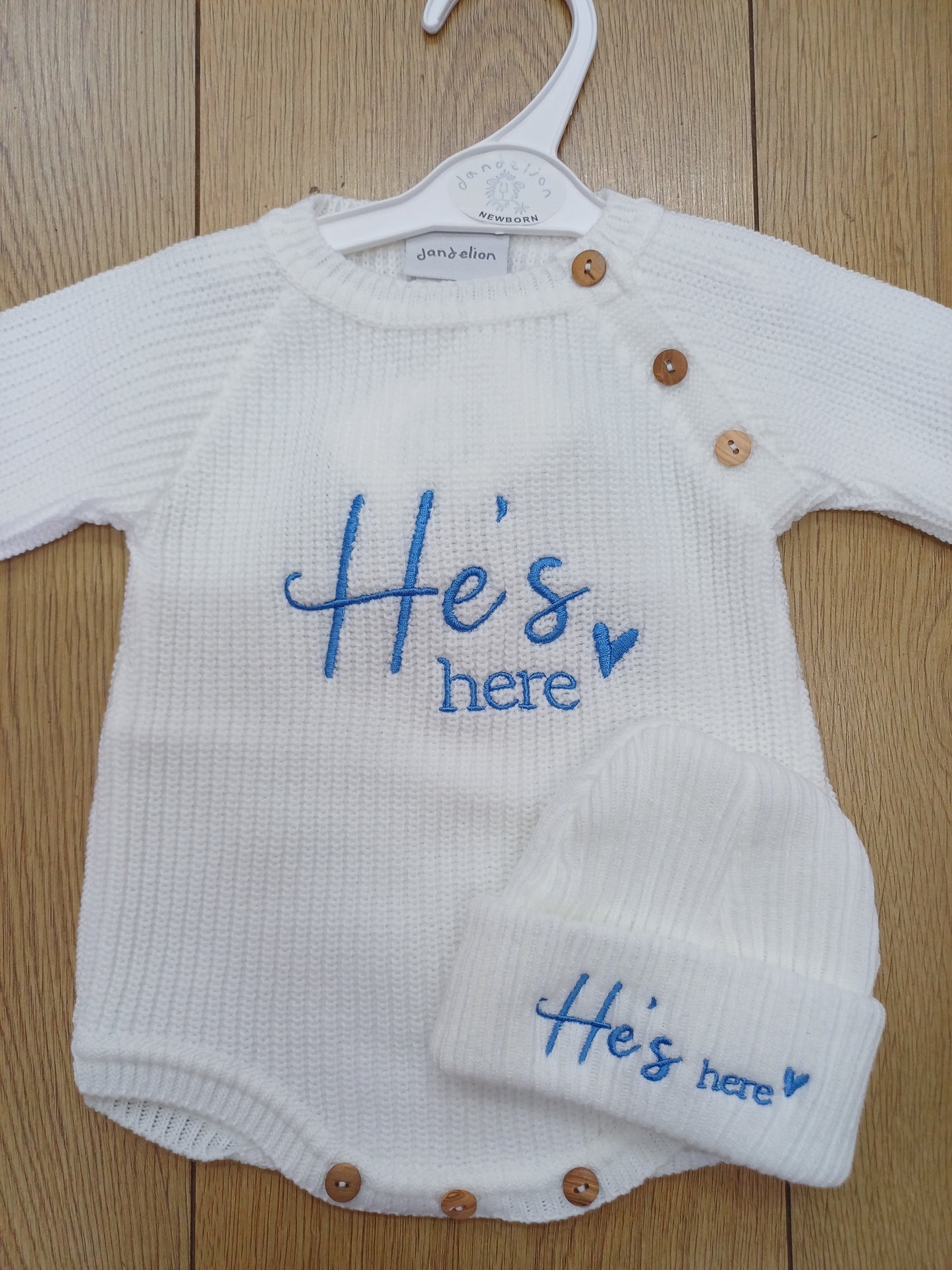 Dandelion Babys knitted romper and hat set with He's or she's here embroidery