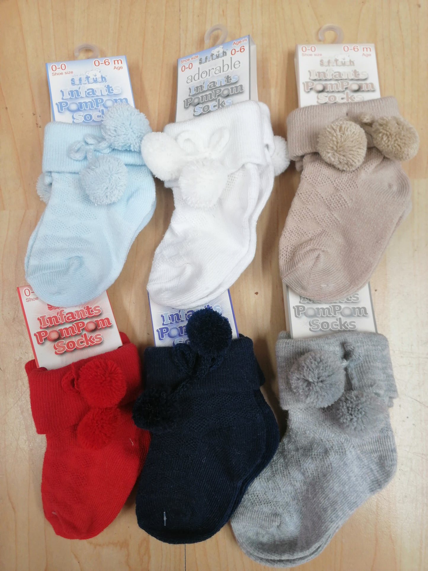 Babys boys and girls ankle pom pom socks sizes newborn to 2 years various colours to choose from