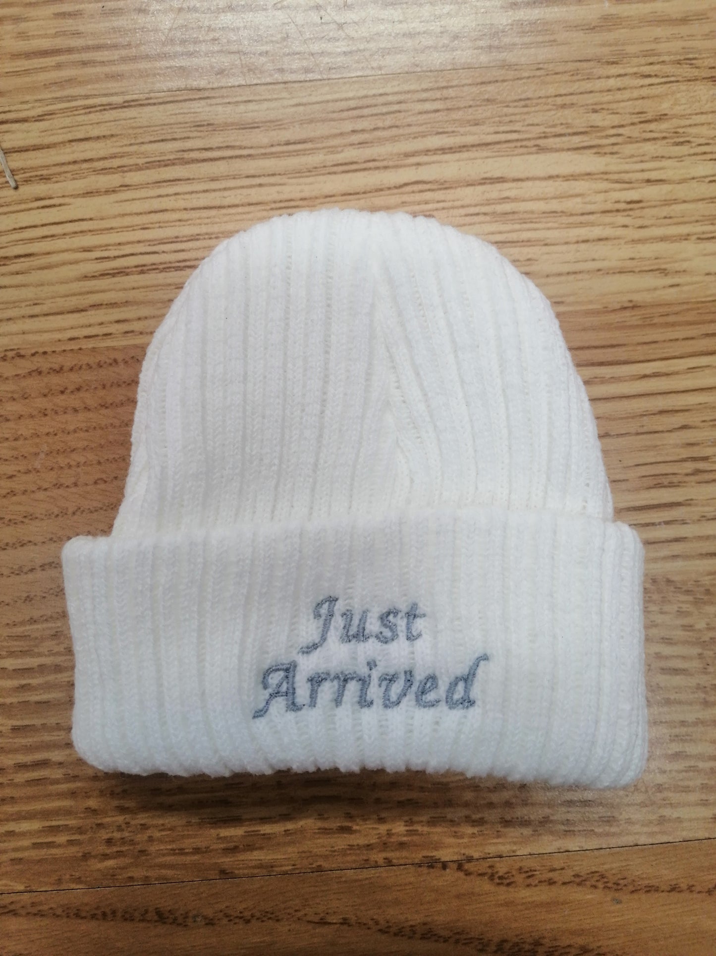 Baby Boys or girls beanie hat embroidered with just arrived size newborn