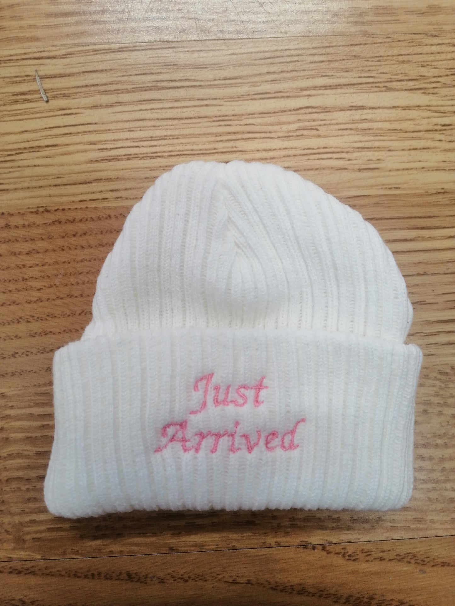 Baby Boys or girls beanie hat embroidered with just arrived size newborn