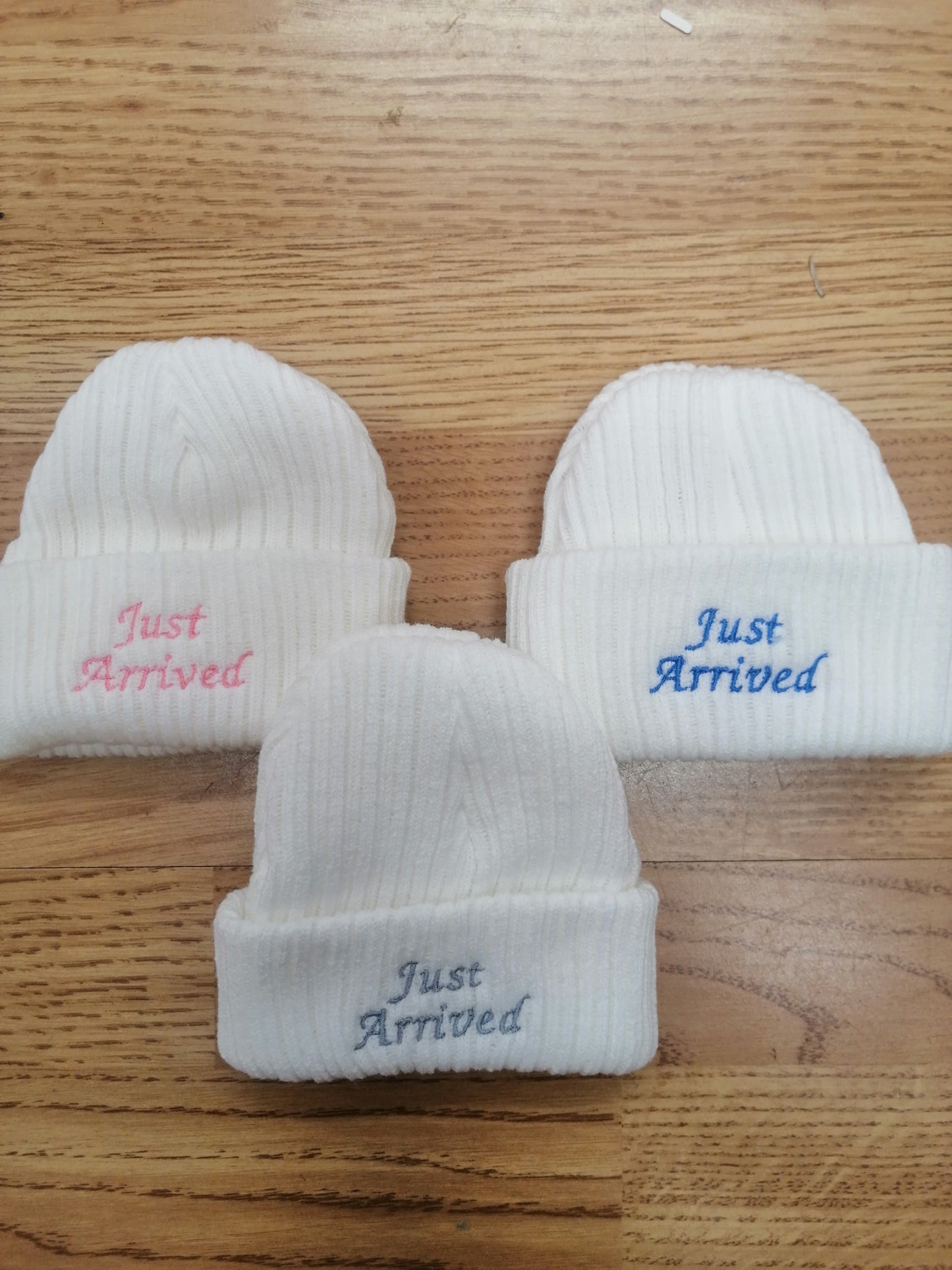 Baby Boys or girls beanie hat embroidered with just arrived size newborn
