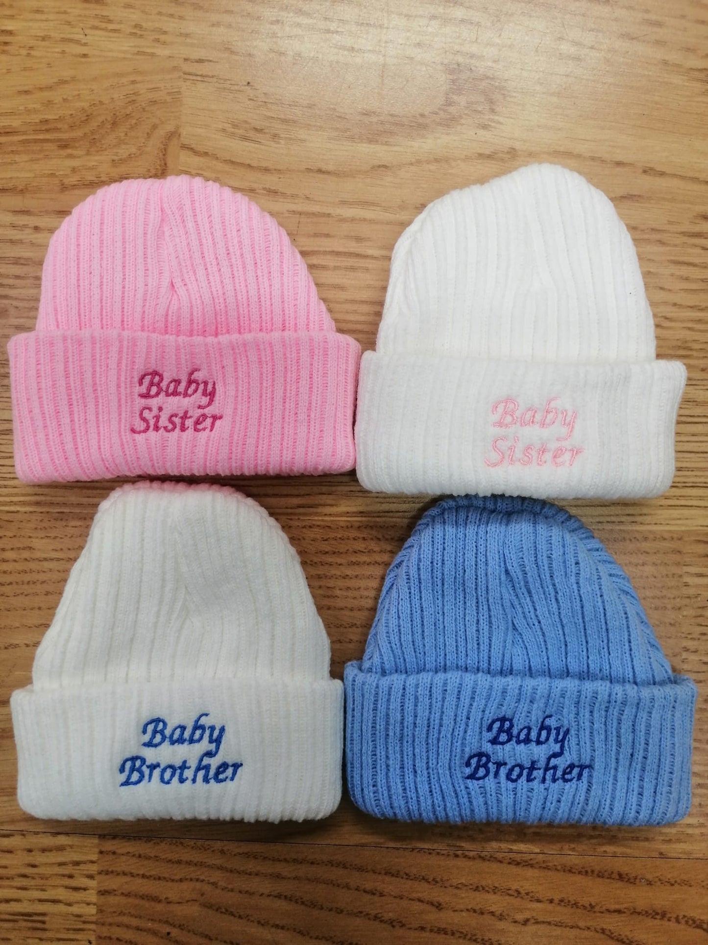 beautiful baby unisex beanie hat embroidered with baby sister or brother. newborn size