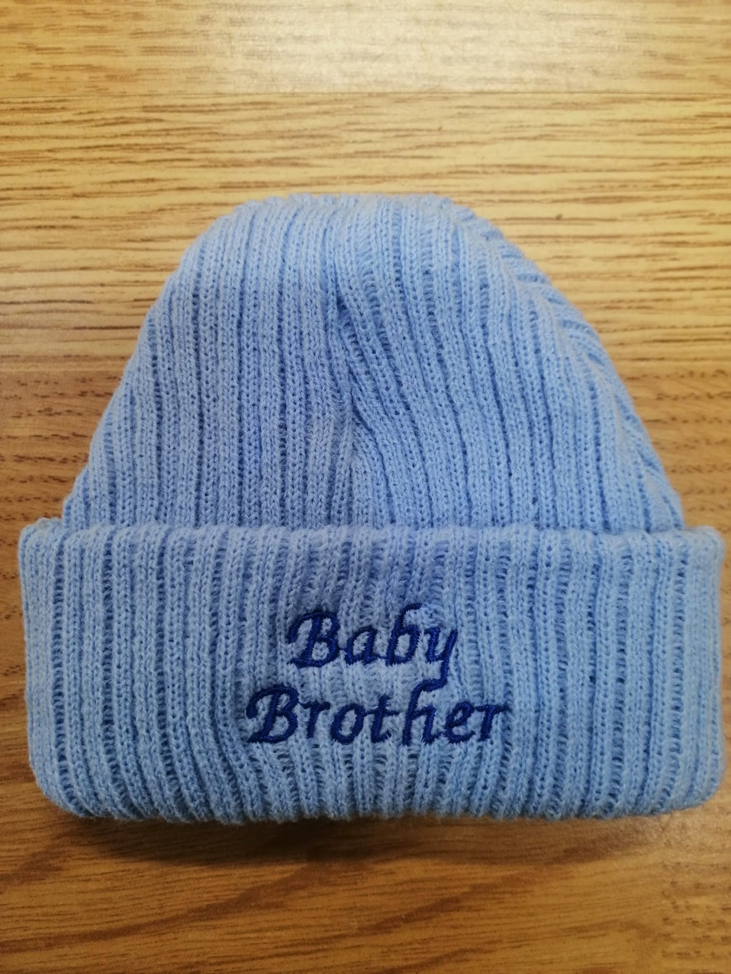 beautiful baby unisex beanie hat embroidered with baby sister or brother. newborn size