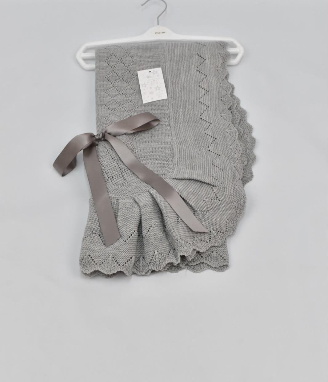 Spanish knitted ribbon bow blanket shawl comes in various colours. 42x 42 inches