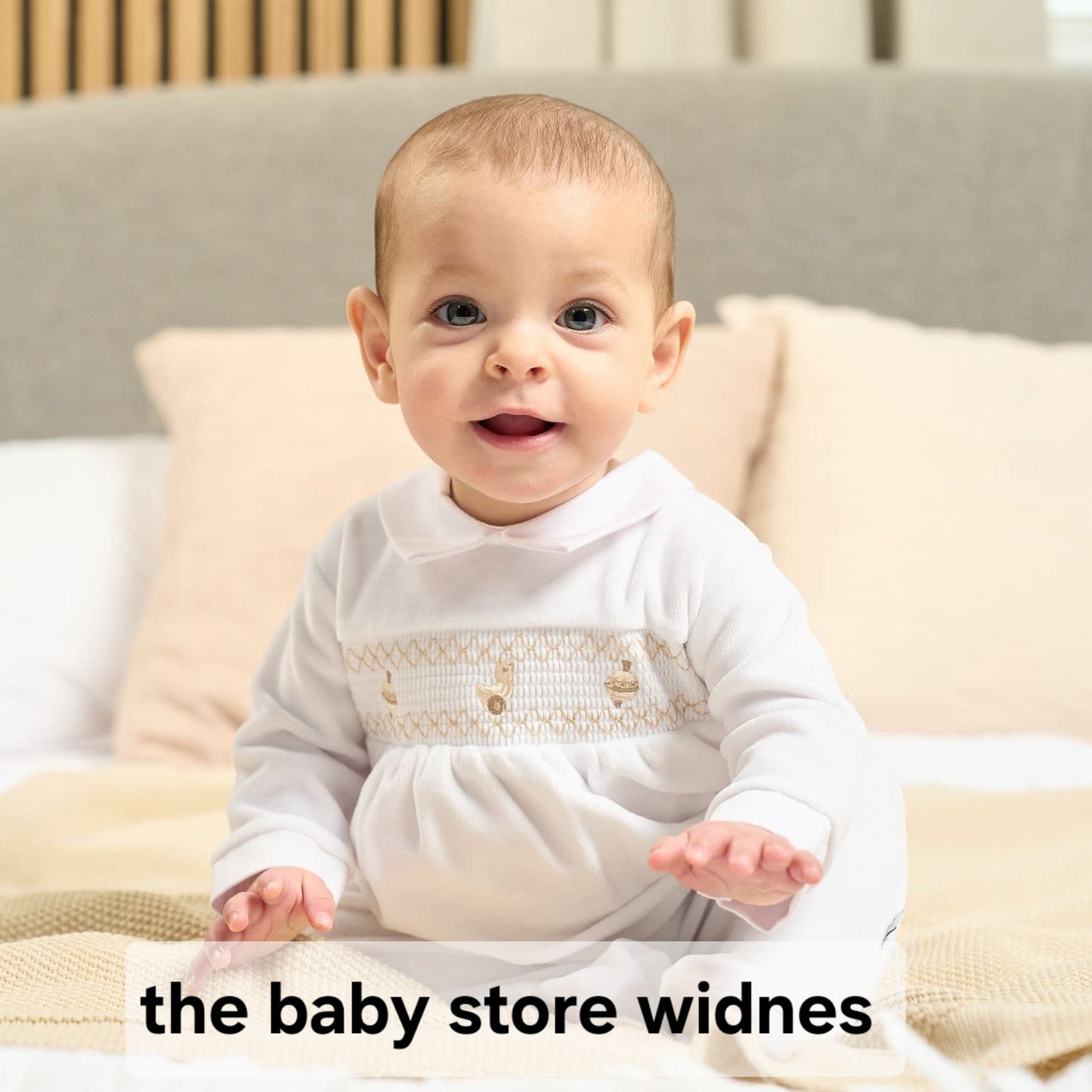 Dandelion spinning top smocked velour sleepsuit