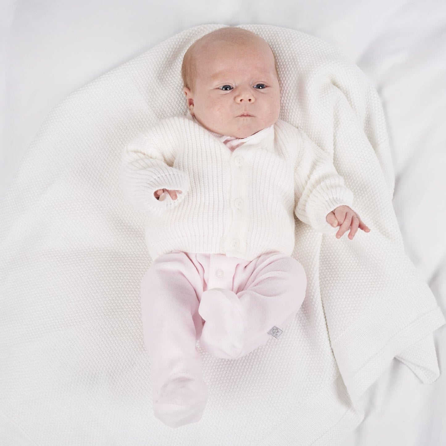 Dandelion babys knitted cardigans sizes from premature to 3 months various colours to choose from