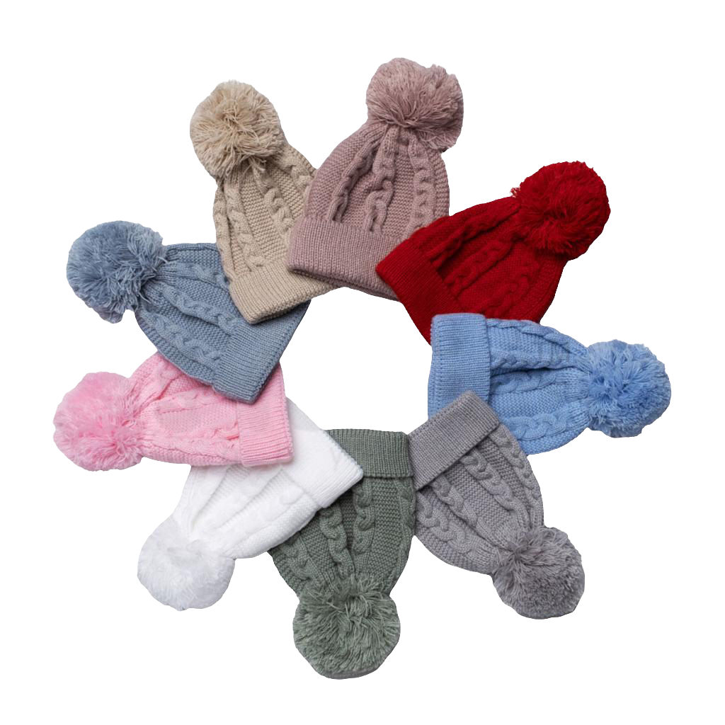 Knitted cable pattern hats with pom pom