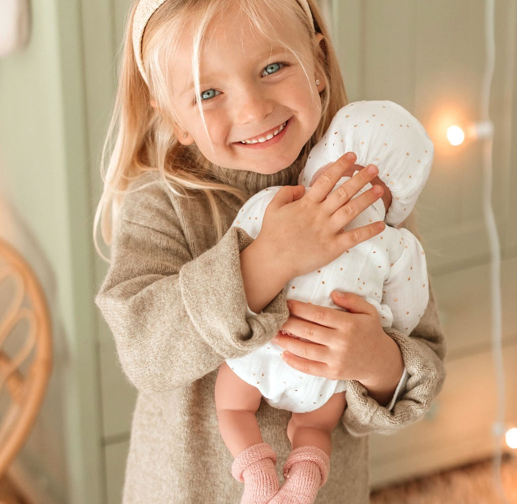 Spanish newborn crying doll comes with carrycot and dummy