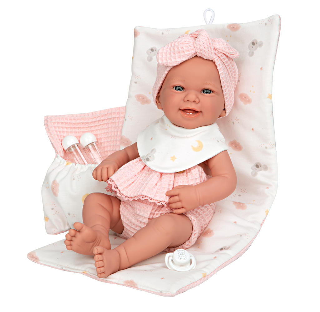Spanish newborn doll comes with changing mat and bib also a dummy