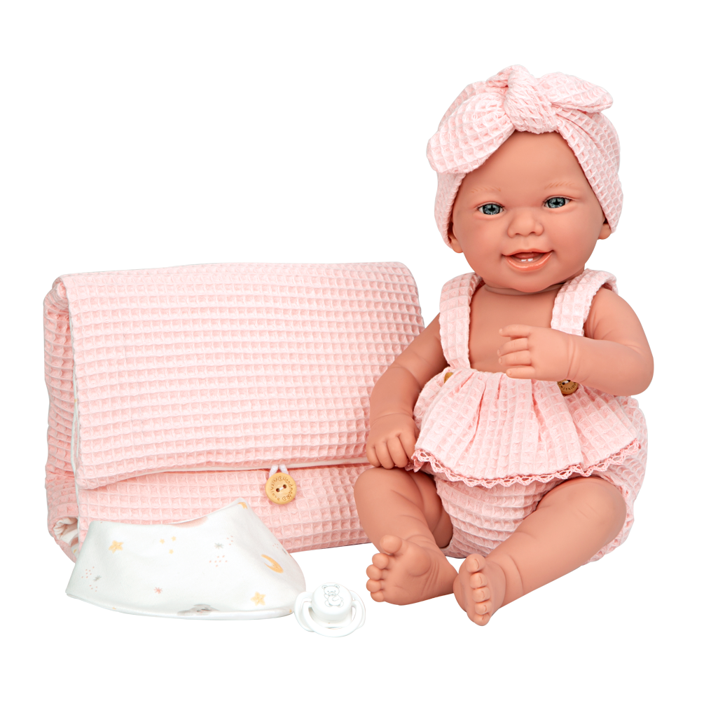 Spanish newborn doll comes with changing mat and bib also a dummy