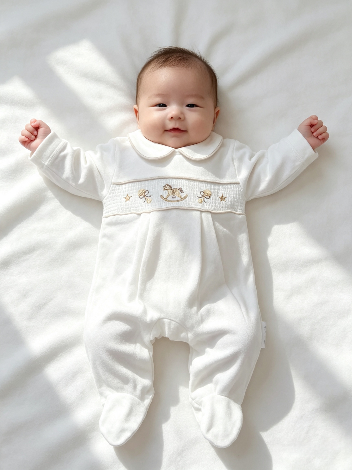 Babys unisex smocked velour  romper with  Rocking Horse embroidery