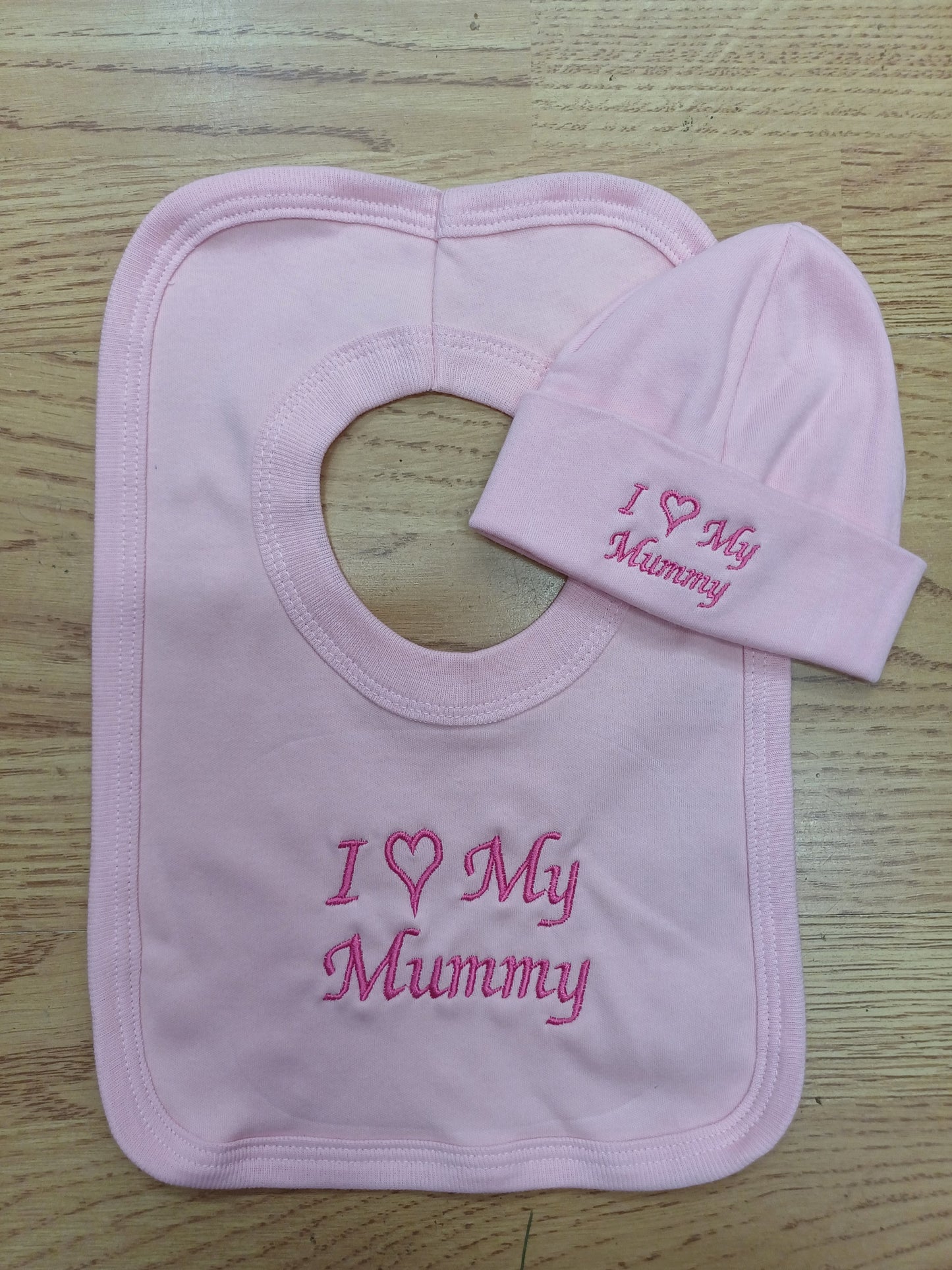 Baby girls  100% soft cotton bib and hat set embroidered with I love my mummy colour pink size newborn