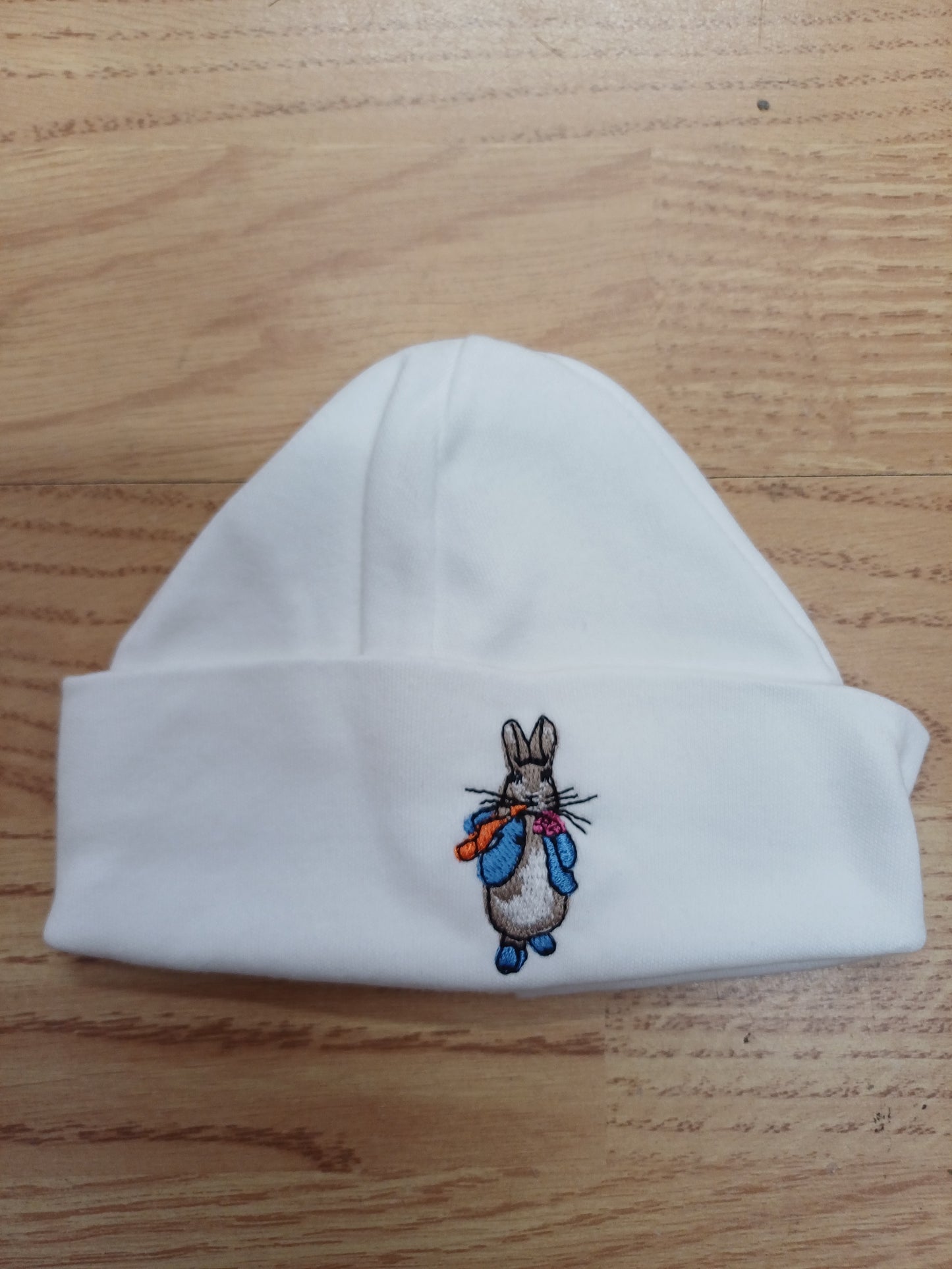 Baby Boys or girls  100 % soft cotton hat embroidered with peter rabbit or jemima puddle duck size newborn