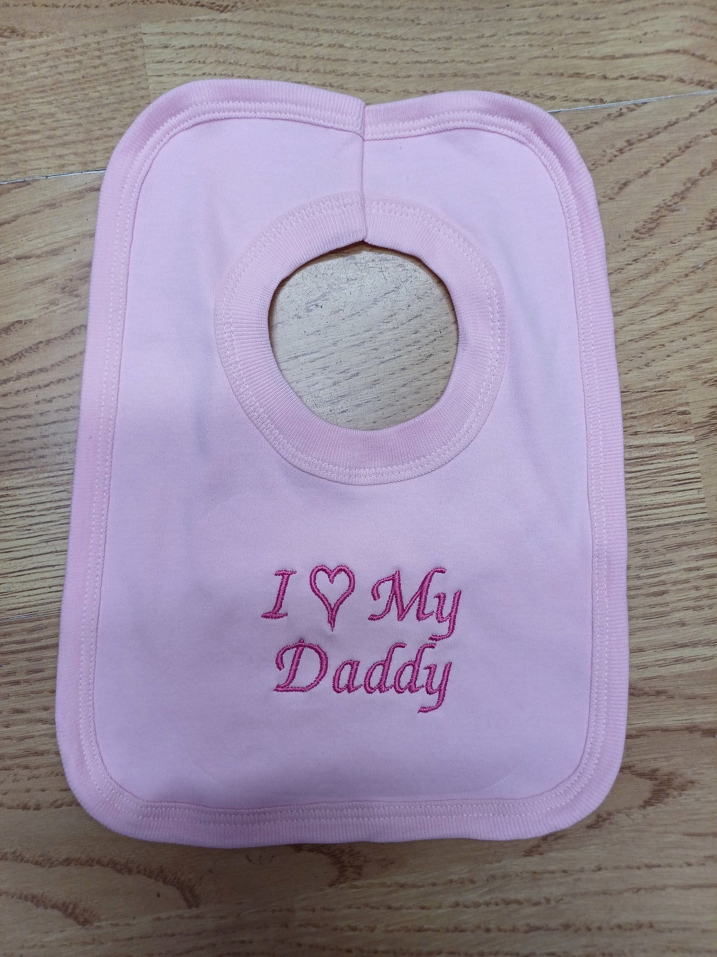 Baby girls  100 % soft cotton bib and hat set embroidered with I love my daddy colour pink  size newborn