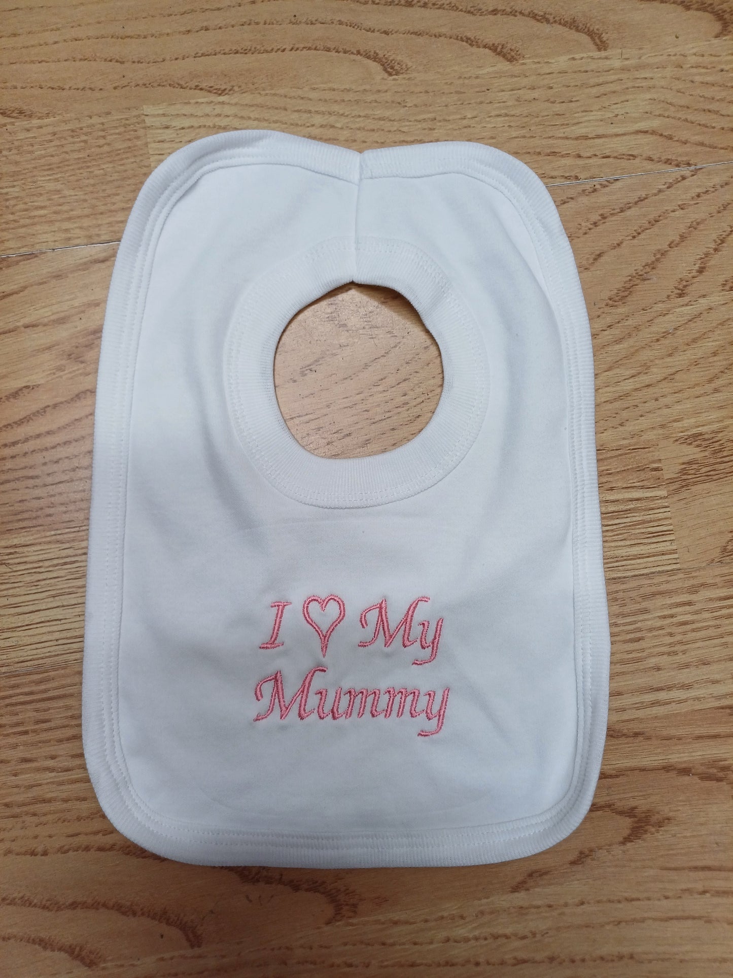 Baby girls  100 % soft cotton bib and hat set embroidered with I love my mummy colour white  / pink  size newborn