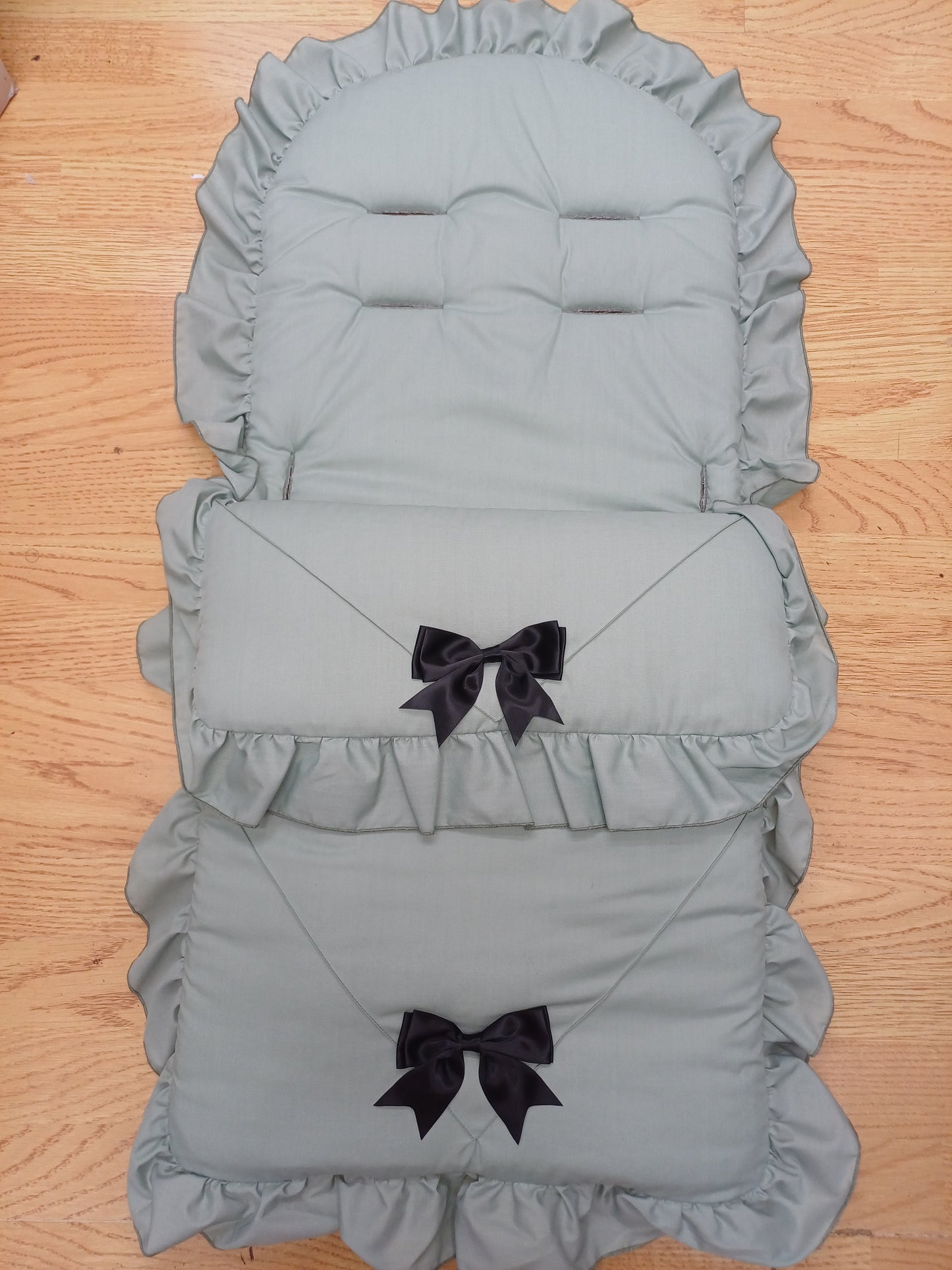 Babys  boys or girls  universal pram cosytoes footmuff pram set with bows colour sage green  / black  bows