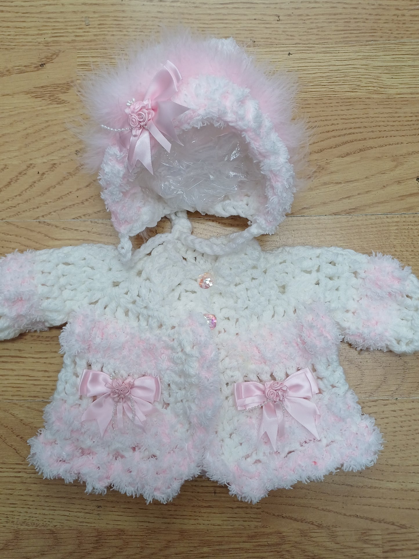 Baby girls handmade crochet pretty cardigan  and  bonnet set  size 0 / 3 months