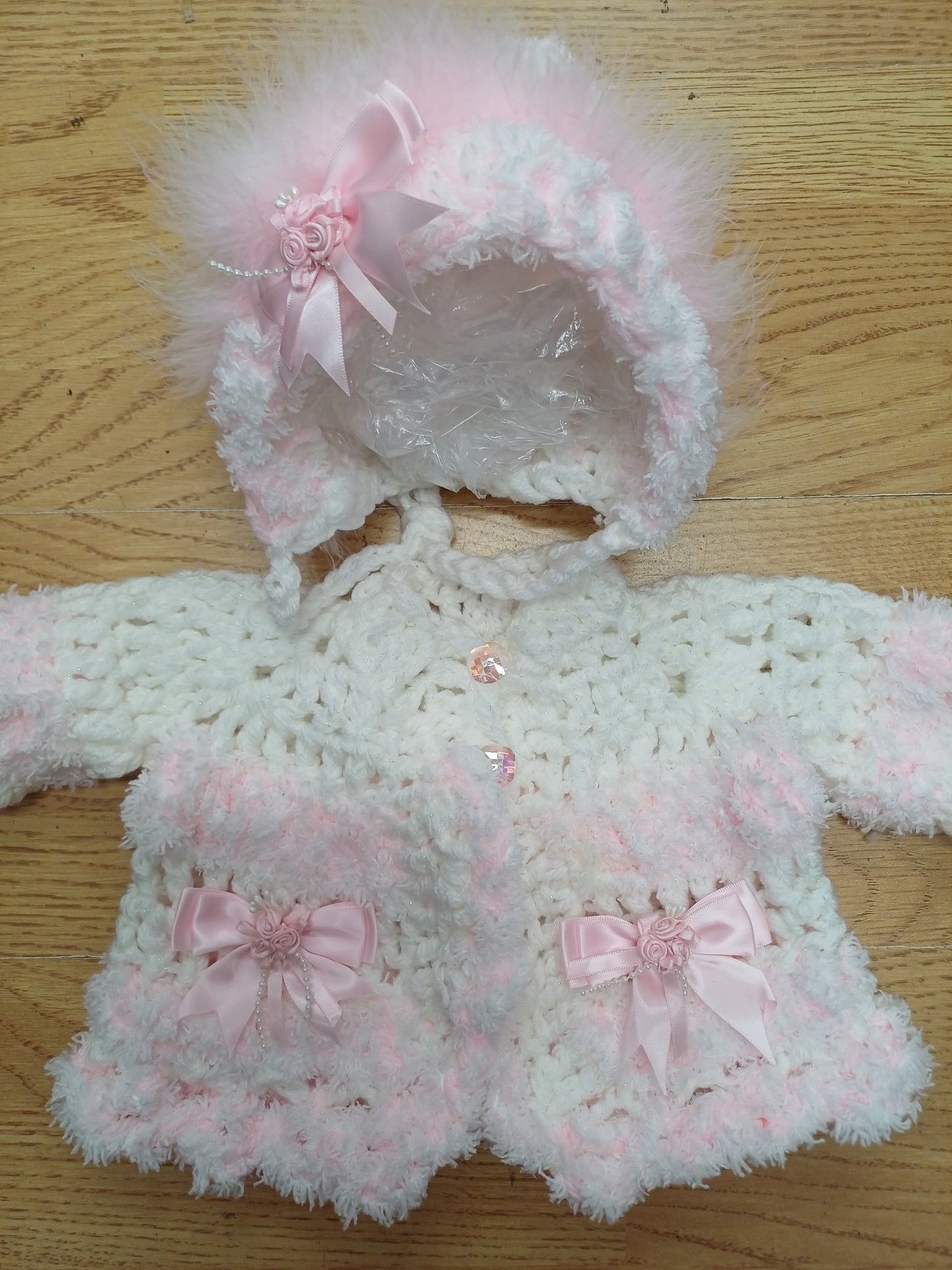 Baby girls handmade crochet pretty cardigan  and  bonnet set  size 0 / 3 months