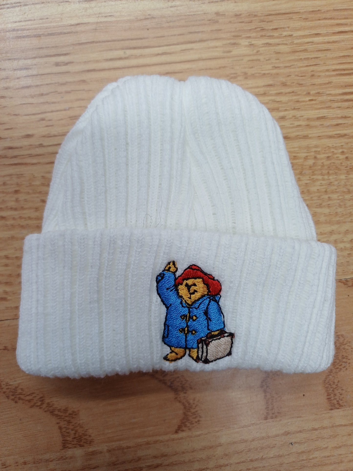 Babys  knitted beanie hats  embroidered with  a bear