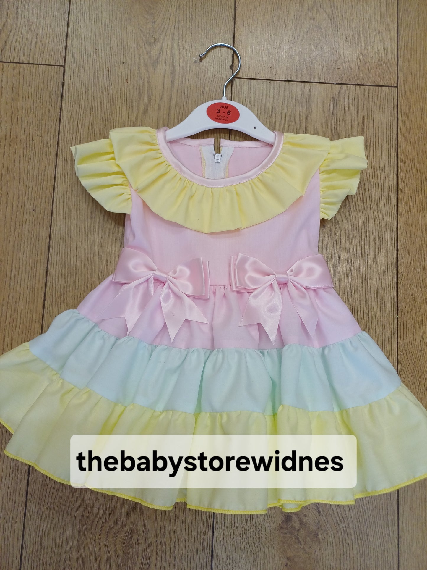 Girls  muti coloured  dress with bows