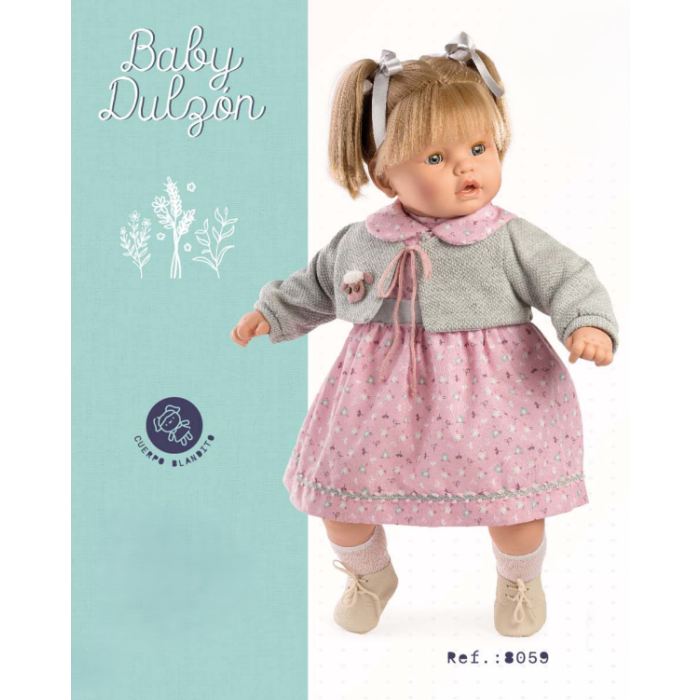 Spanish  toddler crying doll comes  in a beautiful  dress  and cardie  size 62 cm