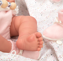 Spanish reborn doll comes with  sleeping bag and  dummy