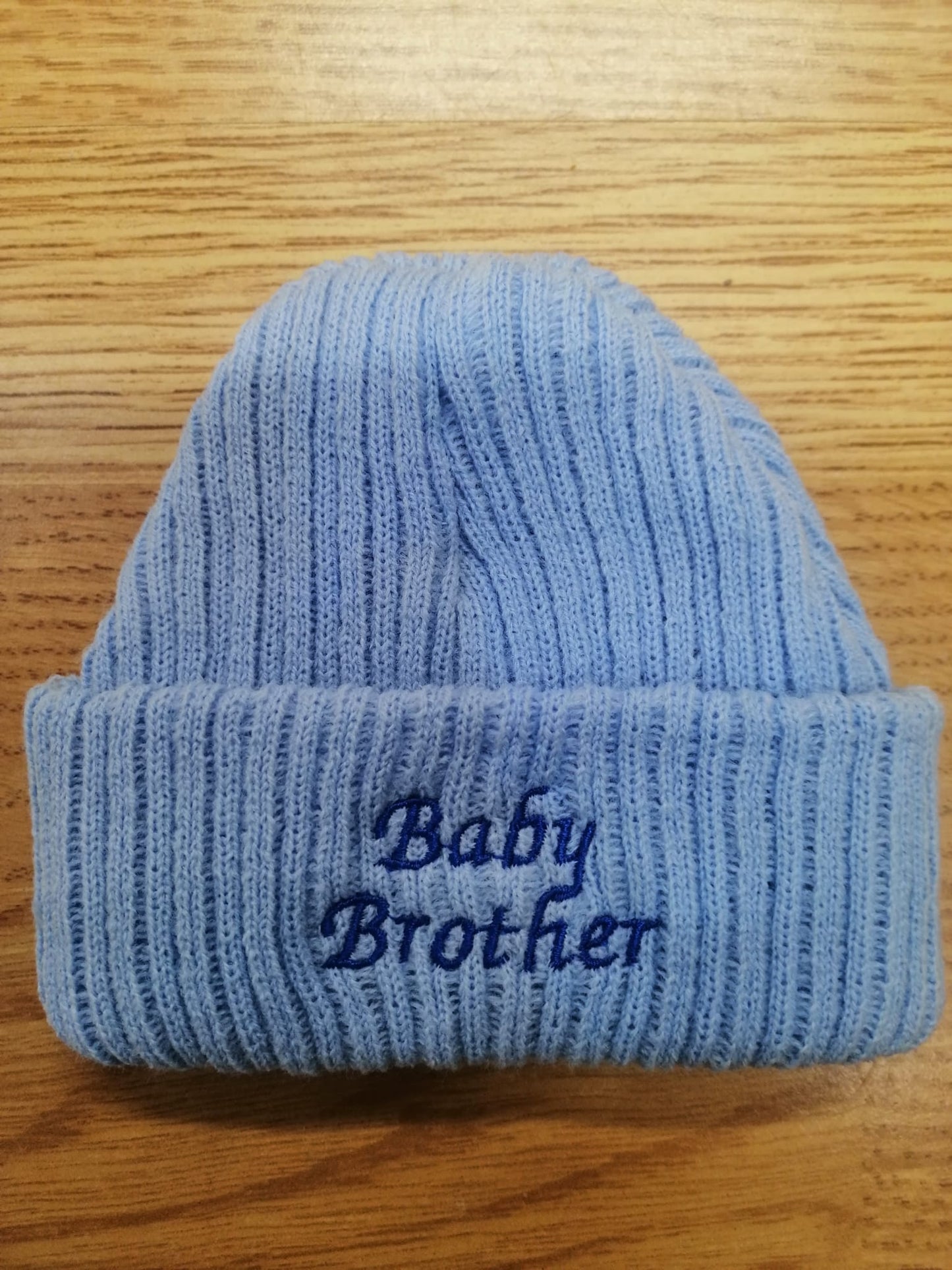 beautiful  baby unisex beanie hat embroidered with baby sister or brother.  newborn size