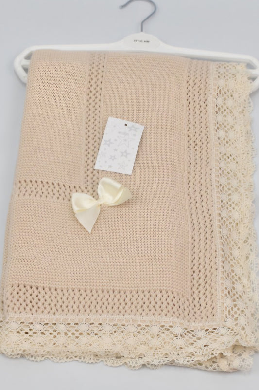 Babys beige knitted ribbon blanket shawl with lace edge