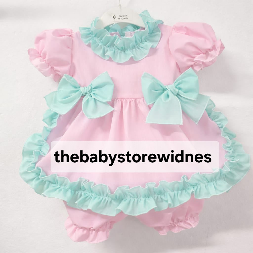 Girls dress with bows and bloomers