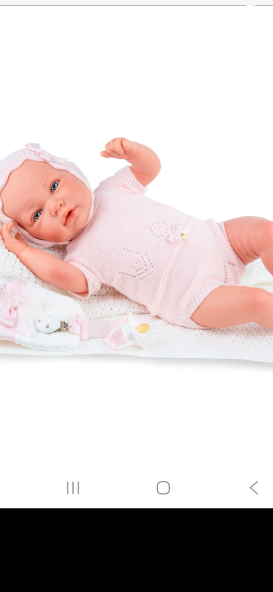 Spanish reborn doll comes with blanket and pacifier