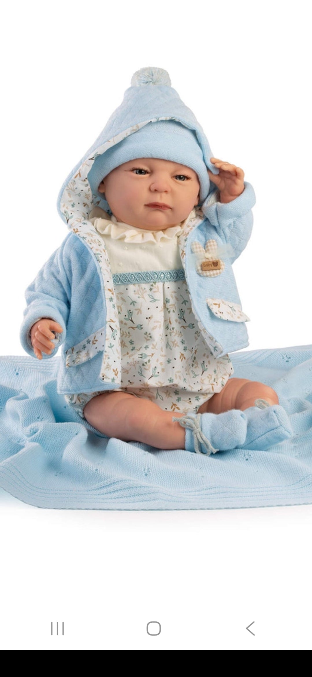 Spanish reborn doll with blanket