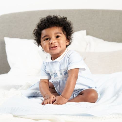 Babys  boys  dandelion  romper with smocking and train endrodiodery