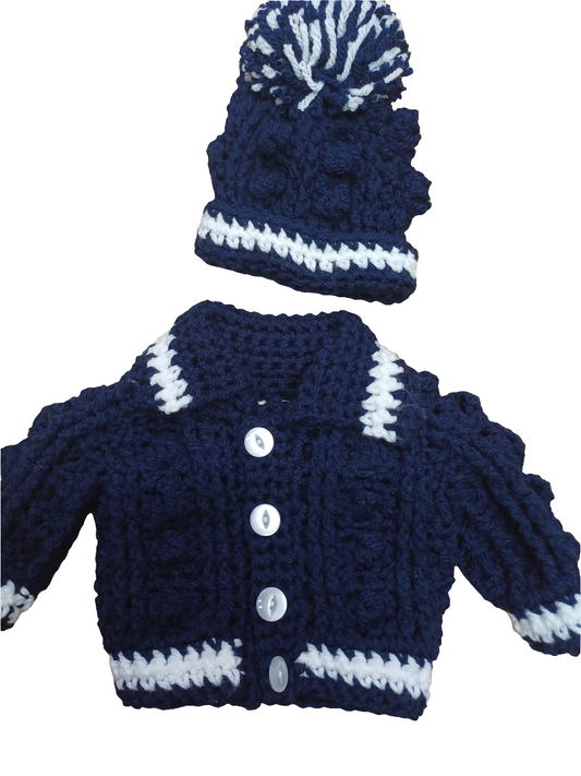 Babys handmade crocheted cardigan and pom hat set