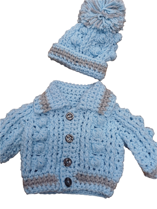 Babys handmade crocheted cardigan and pom hat set