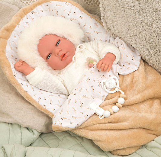 Spanish reborn doll comes with  carrycot. Dummy  clip  and nappy