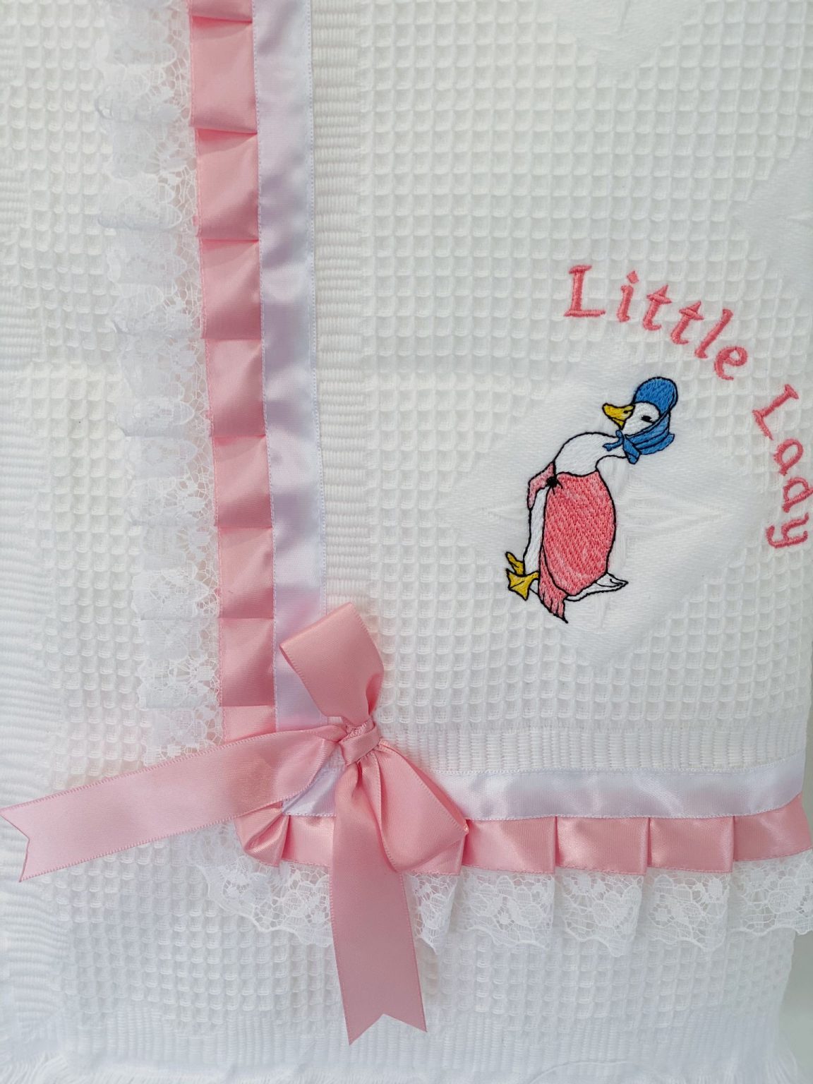 Boys or girls lace  ribbon  shawl / blanket embroidered with peter rabbit or jemima puddle duck