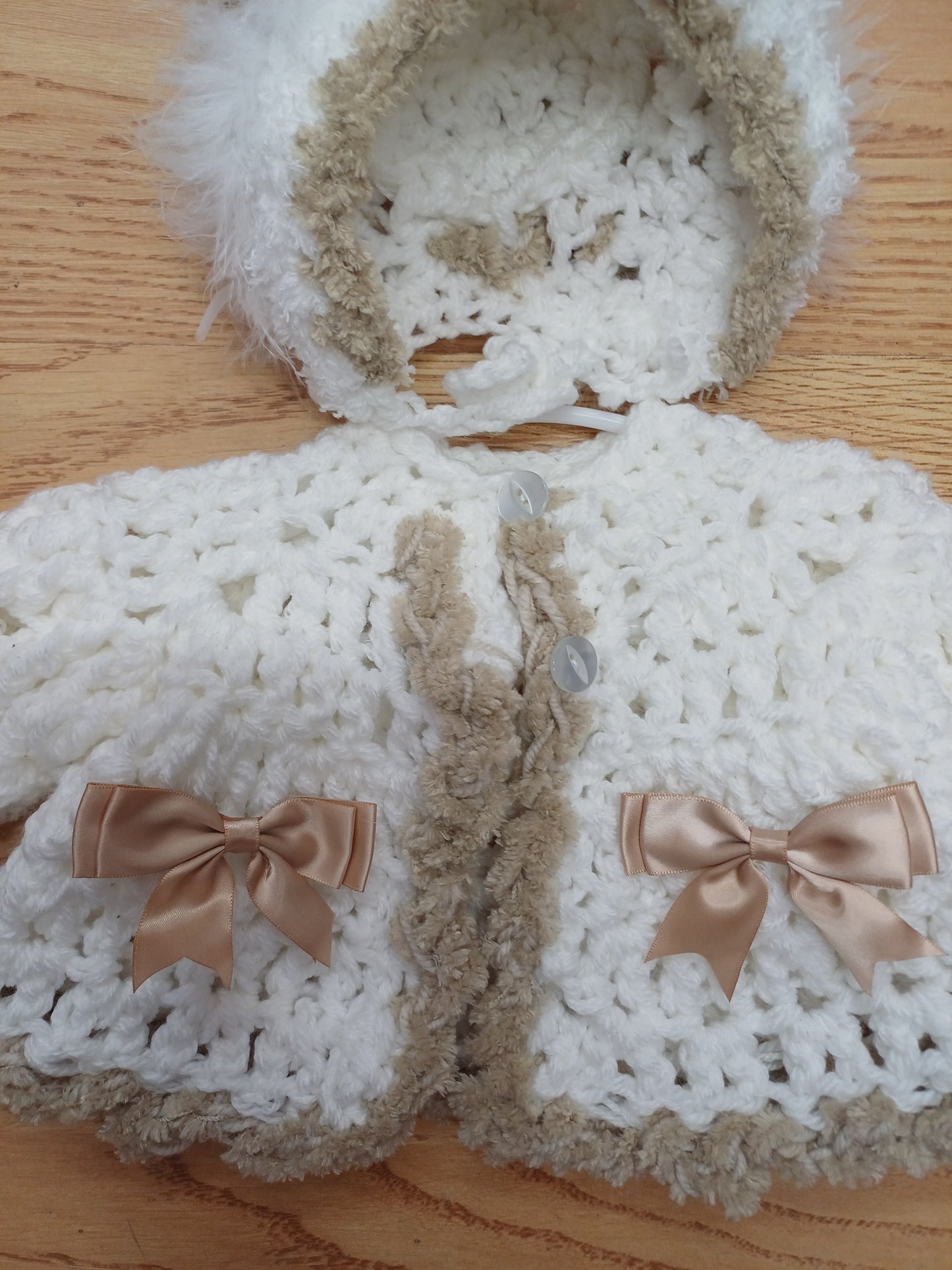 Baby girls. Handmade crochet pretty cardigan and bonnet set with bows