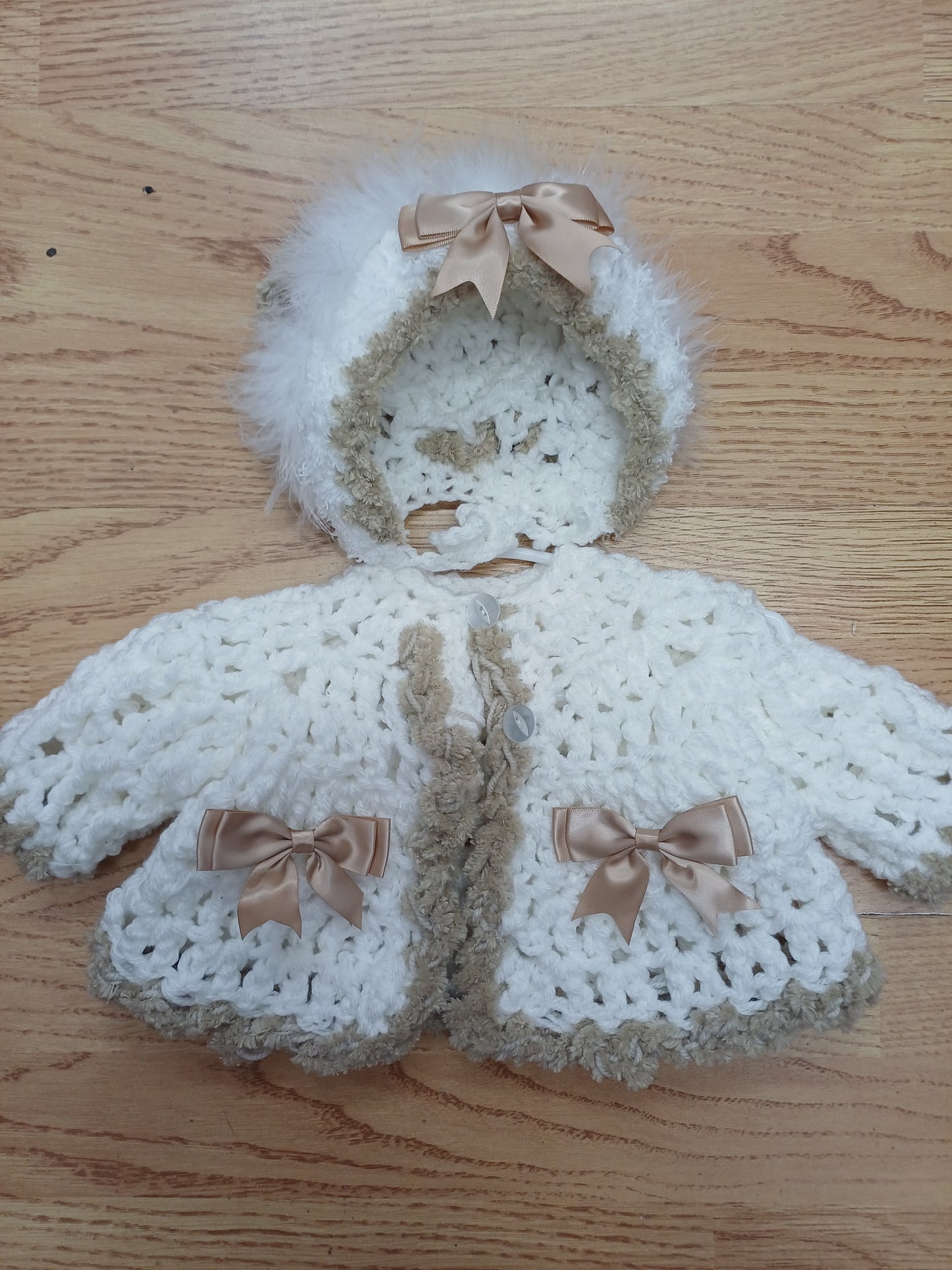 Baby girls. Handmade crochet pretty cardigan and bonnet set with bows