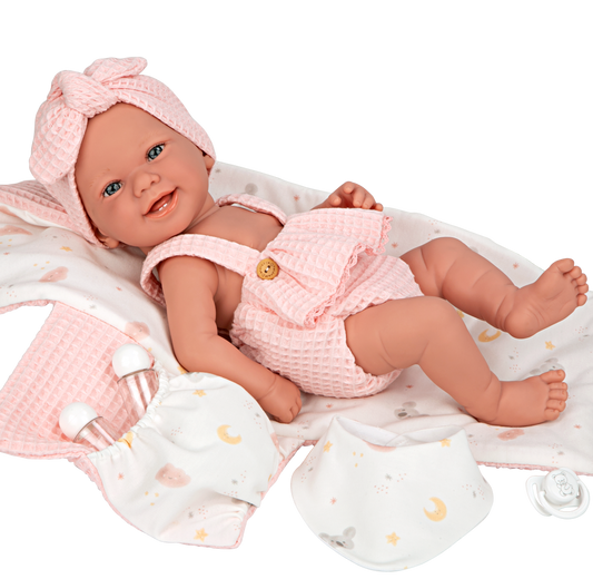 Spanish  newborn doll comes with changing mat and bib also a  dummy