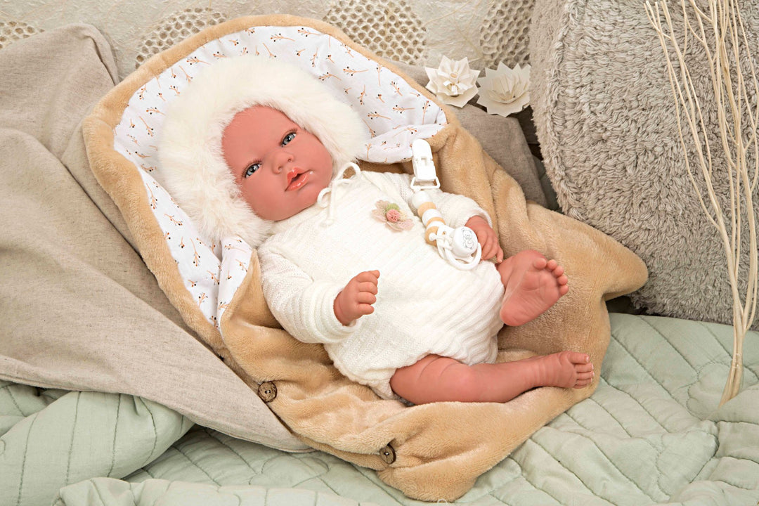 Spanish reborn doll comes with  carrycot. Dummy  clip  and nappy