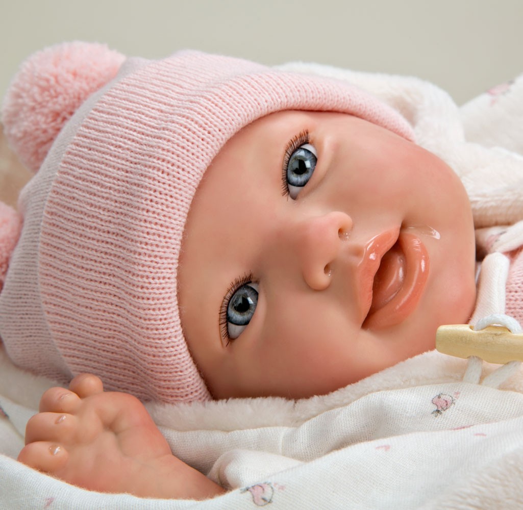 Spanish reborn doll comes with  blanket and dummy